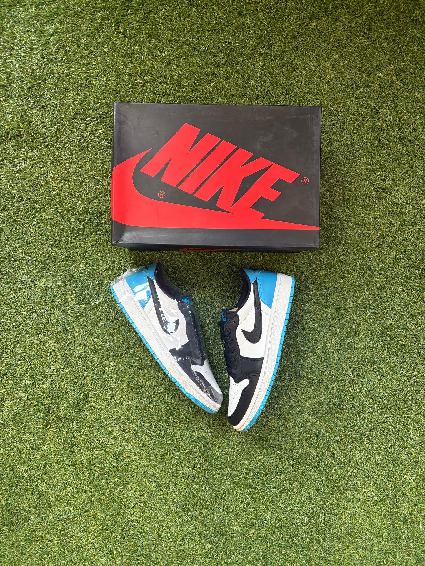 Jordan 1 Retro Low OG “Black Dark Powder Blue”